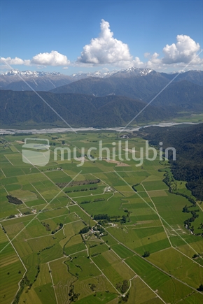 Aerial of dairy and cropping farms near Rotomanu in Westland, South Island, New Zealand