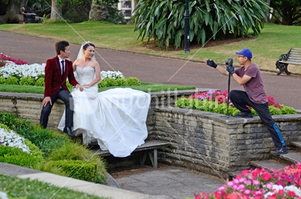 Asian, Auckland, bride, bridegroom, camera, Chinese, cities, city, couple, couples, editorial, event, Photographers document a couple's wedding day in Albert Park. 2015.