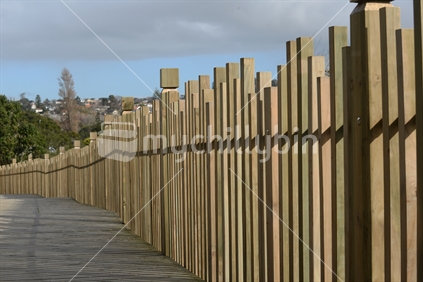 Ornamental fence along the walkway at the Orakei Basin in Auckland near where the Orakei Pa once stood