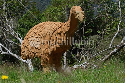 Wooden sculpture of the extinct New Zealand moa near Otira, South Island
