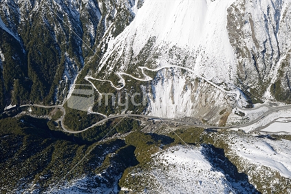 Spectacular aerial view of the Otira Viaduct and the old zig-zag road that it replaced in the Southern Alps near Arthus Pass, Westland, New Zealand