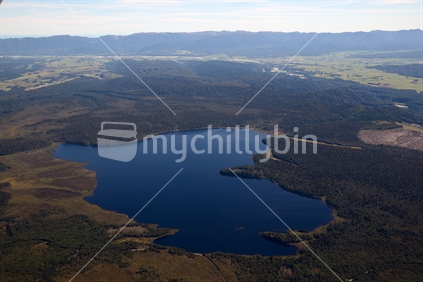 Aerial of Lake Hoschtetter, West Coast, with the Paparoas in the background