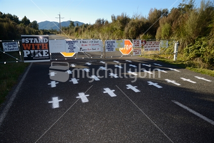 Protest signage set up at the entrance of the Pike River Coal mine near Greymouth, New Zealand. 29 miners died at the mine in 2010.