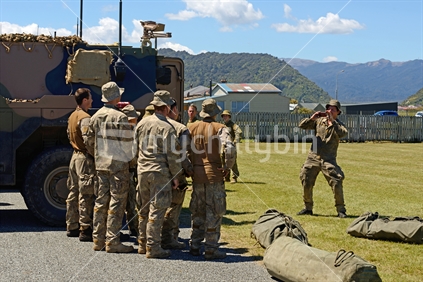 A team of soldiers line up for photos after an open day in Greymouth for the military.