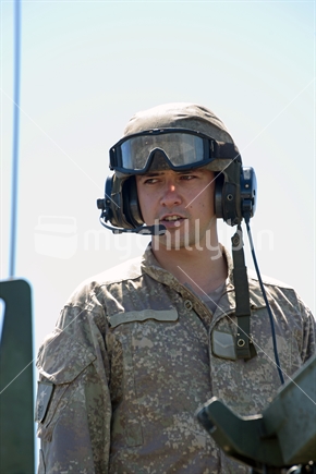 A crew member of a Light Armoured Vehicle (LAV) speaks to his team at an open day in Greymouth for the military.GREYMOUTH, NEW ZEALAND, NOVEMBER 18, 2017