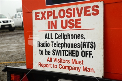 Signage warns visitors of the use of explosives as oil well engineers seal and abandon an 850m deep oil well. Explosives were used down hole to cut steel casing.