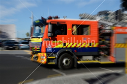 Zoom effect highlights a Christchurch fire rescue truck in the CBD