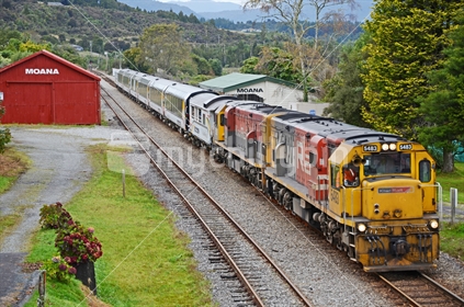 MOANA, NEW ZEALAND, APRIL 23, 2018: A passenger train, the Tranz Scenic, pauses at the Moana Railway station for passengers to disembark.