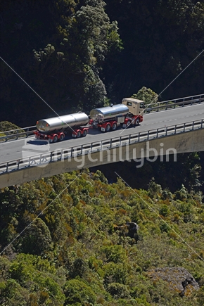 A tanker from Westland Milk Products navigates the Otira Viaduct over the Southern Alps