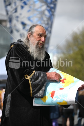 CHRISTCHURCH, NEW ZEALAND, OCTOBER 12, 2019: The wizard of Christchurch speaks in Cathedral Square to a crowd of tourists and spectators.