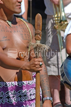 Man dressed in traditional Maori costume at Waitangi Day celebrations, Greymouth