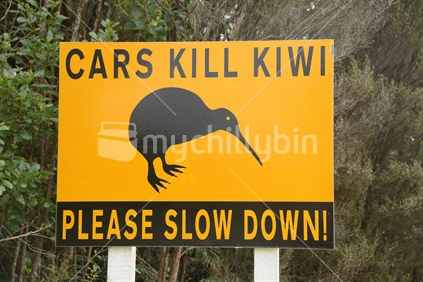 A road sign warns drivers to beware of Kiwi as they drive into Okarito in New Zealand's South Island
