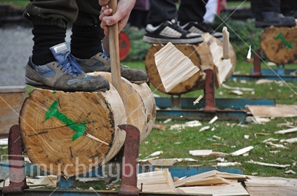 Feet of axemen in woodchopping event at Shantytown, Westland