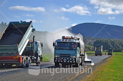 workers and equipment used for tar sealing a private air strip, Westland