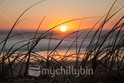 Sunset over Baylys beach 2; Northland