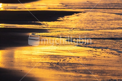 Tide washing in on sunset (landscape)