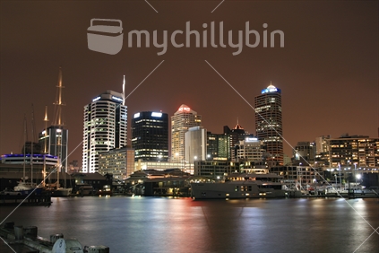 A night scene in the Viaduct Basin, overlooking Auckland's CBD, New Zealand.