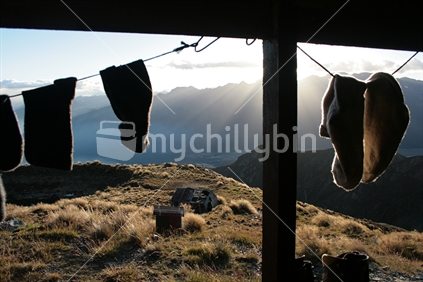 Looking at the sunset over the Humboldt Mountains from Mcintosh tramping hut, near Glenorchy.
