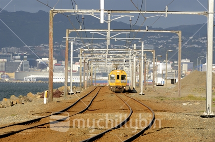 Wellington industrial area and a commuter electric train travelling to the Hutt Valley