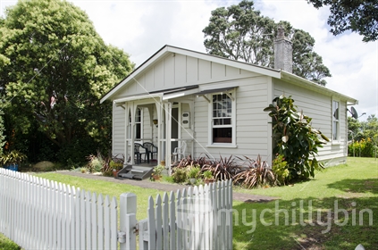 Early weatherboard home with double hung windows; West Auckland