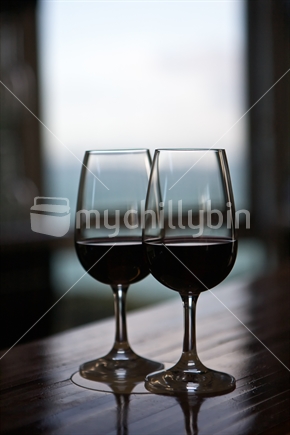 Glasses of red wine on Waiheke island.