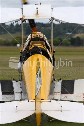 Tiger Moth taxiing to runway for takeoff