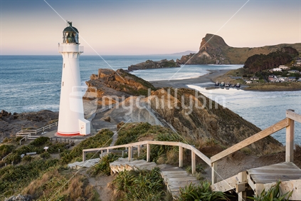 Lighthouse at Castlepoint towers over Deliverance Cove. Wairarapa district.