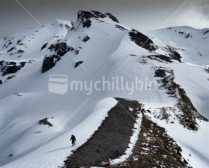 Solo mountaineer returns from winter snow climb up Mount Arthur in Kahurangi National Park, near Nelson