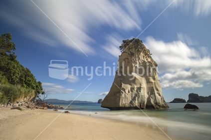 Te Hoho Rock on sandy beach at Cathedral Cove, a popular walk in the Coromandel Peninsula