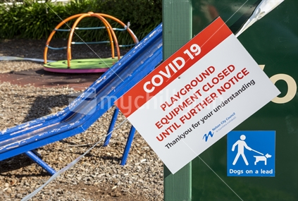 Covid-19 sign on closed council playground