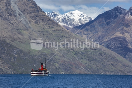 The mountains on Lake Wakatipu with a distant TSS Earnslaw, Queenstown, Otago