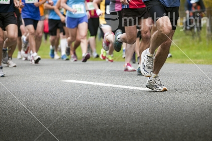 Leaders legs (focus), at the start of a 10Km harrier race