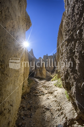 Sunburst on canyon walls at Clay Cliffs, Omarama, Canterbury