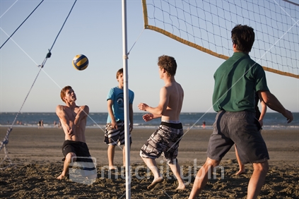 Teenagers play volleyball on Tahunanui Beach, Nelson