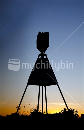 Trig station on Kaka Hill, Nelson, silhouetted at dusk - closeup
