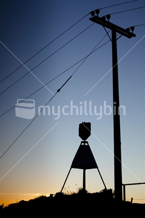 Trig station on Kaka Hill, Nelson, silhouetted at dusk