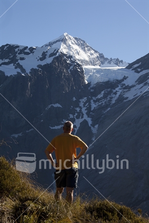 Peak and Person, with the Breakaway Glacier tumbling off Mt Aspiring into the shadows of Matukituki valley.