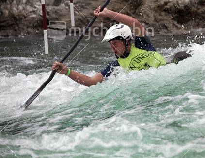 Man in kayak navigates tricky white water in slalom event on the Buller River