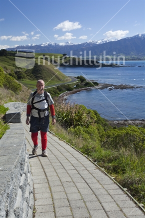 Man approaches on Kaikoura walkway, South Island