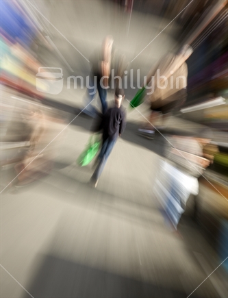 Zoom burst - Male shopper walking through crowded market