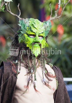 Leafy antler man in costume at Nelson's annual Masked Parade (high ISO)