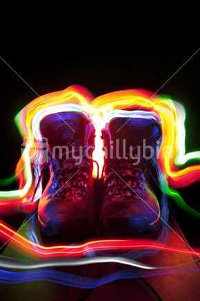 Pair of tramping boots painted with lights