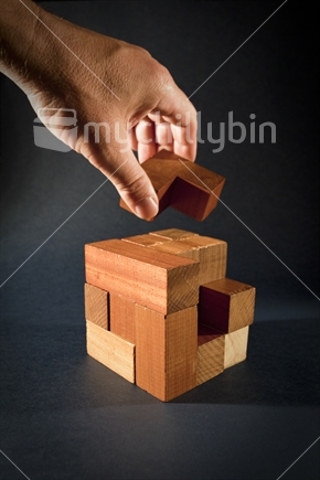Hand building a wooden soma cube