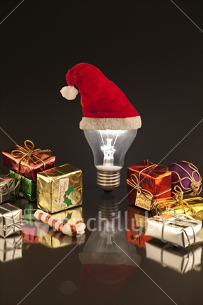 Bright ideas for Christmas - an illuminated light bulb wearing a Santa hat