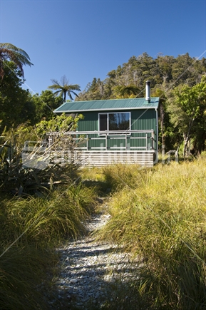 DOC hut at Stafford Bay, South Westland, is a remote backcountry destination