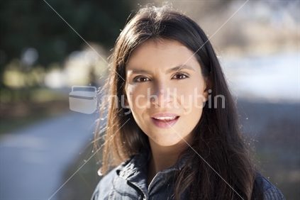 Warm smiling woman with pretty face.
