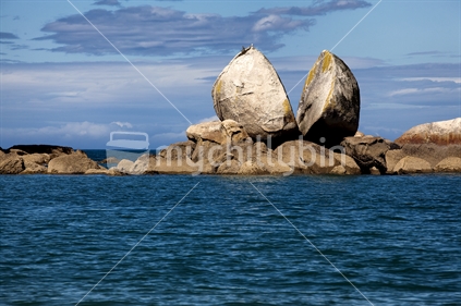 The iconic Split Apple Rock is a popular tourist destination on the edge of Abel Tasman National Park, Nelson province