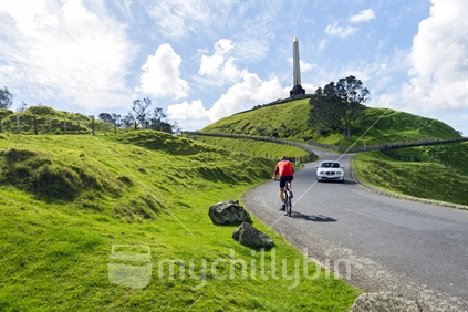 One Tree Hill obelisk with cyclist and car