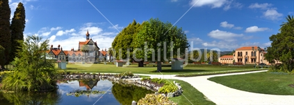 Panoramic shot of Government gardens in Rotorua with Rotorua Museum and Blue Baths in the distance.