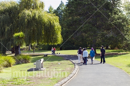Asian family walking in a park 